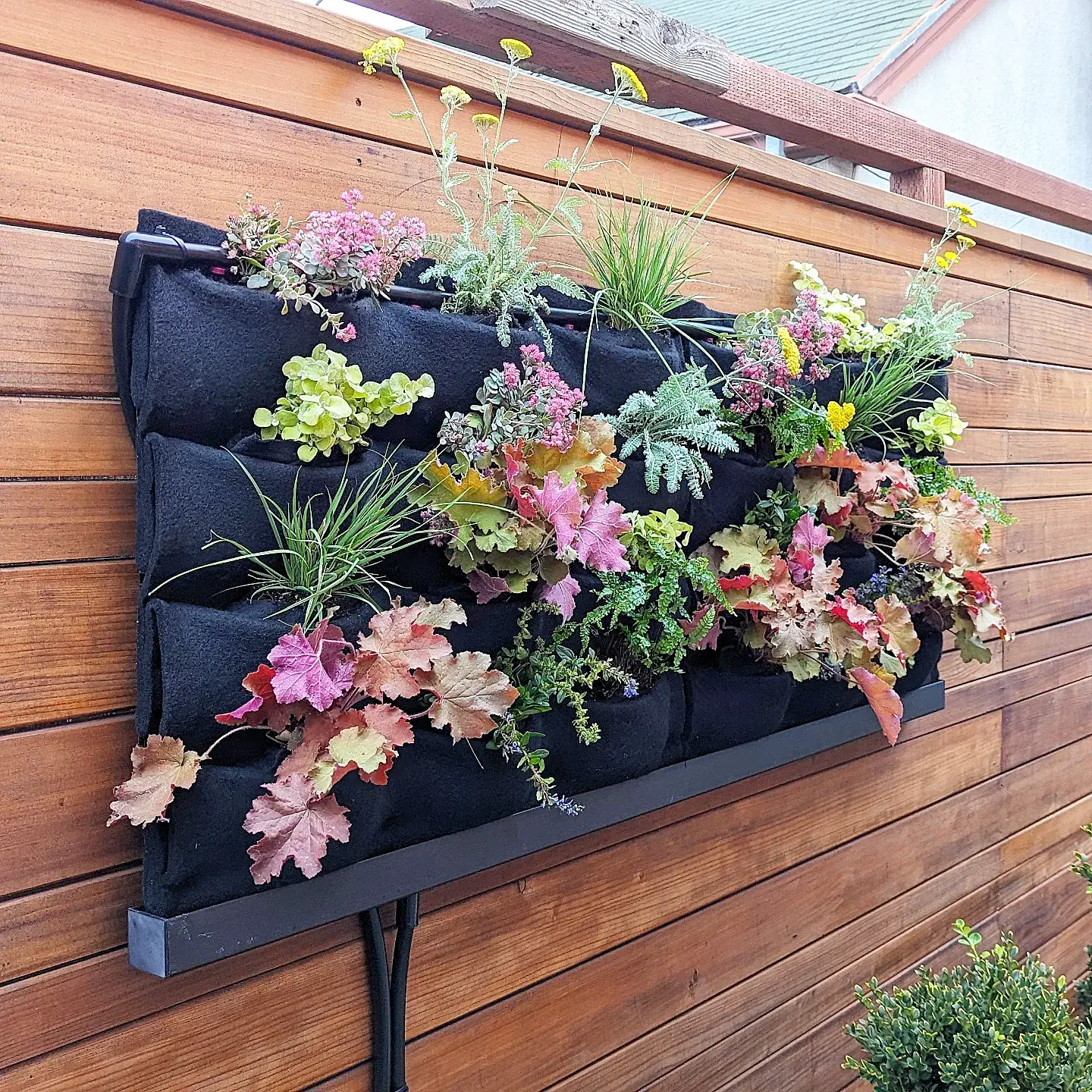 Transform Your Garden with These Creative Vertical Pocket Planter Ideas 6